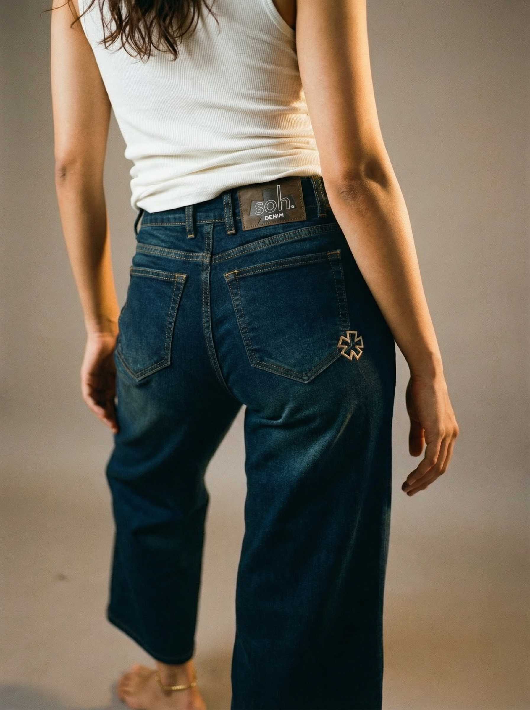 Person wearing Nova Afterlight Indigo jeans.