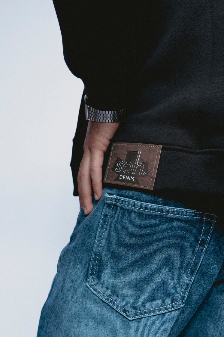 Person wearing a SOH Hoodie Error 01 with a visible SOH leather patch