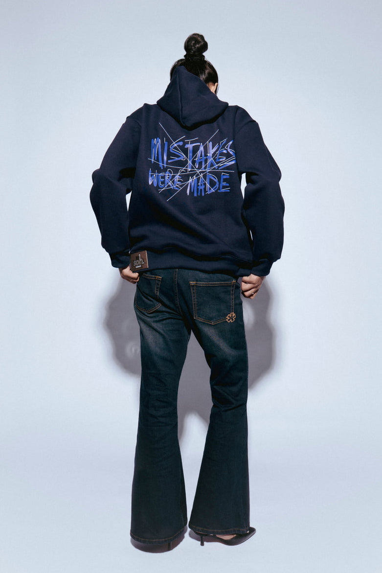 Woman wearing a SOH Hoodie Error 02 